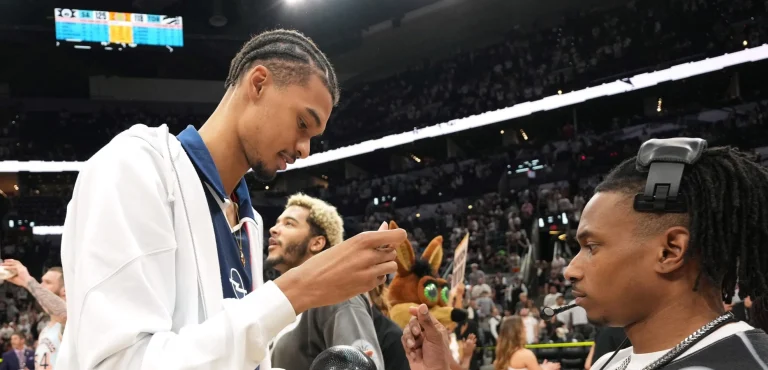 Draymond Green celebrates PSG's UCL victory