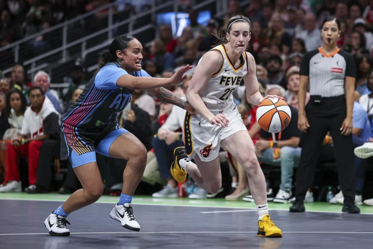 Kelsey Plum WNBA courtside trash talk response