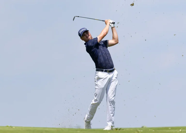 Justin Thomas leads windy Travelers Championship battle