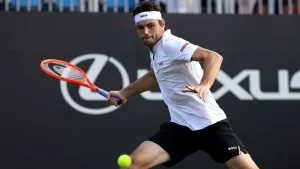 Taylor Fritz and Joao Fonseca’s Epic Eastbourne Clash Suspended: Who Will Triumph When Play Resumes?