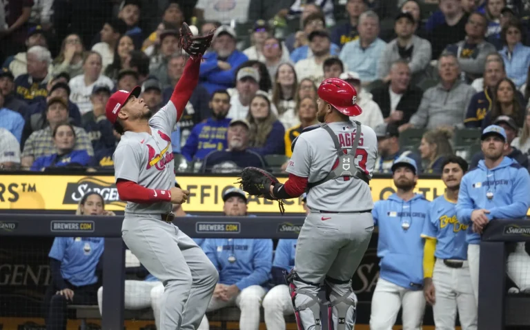 Willson Contreras Brewers first base collision exchange