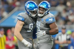 Aidan Hutchinson Eyes Next Level as Lions Rally with Marcus Davenport for Playoff Push