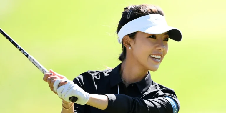 Alex Albon golfing with Muni He