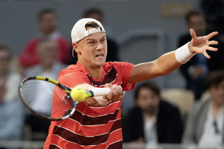 Andre Agassi mentoring Holger Rune