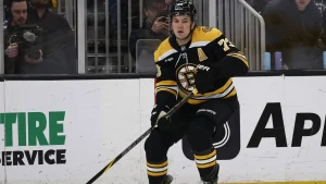 Charlie McAvoy’s Son Rocks Bruins Mini Helmet in Adorable Family Moment