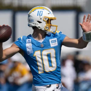 Justin Herbert Sparks Dating Rumors After Public Sighting with Award-Winning Singer Madison Beer