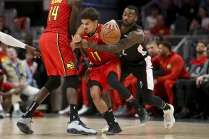 Caleb Houstan Signs with Hawks as Trae Young Aims to Boost Assist Game